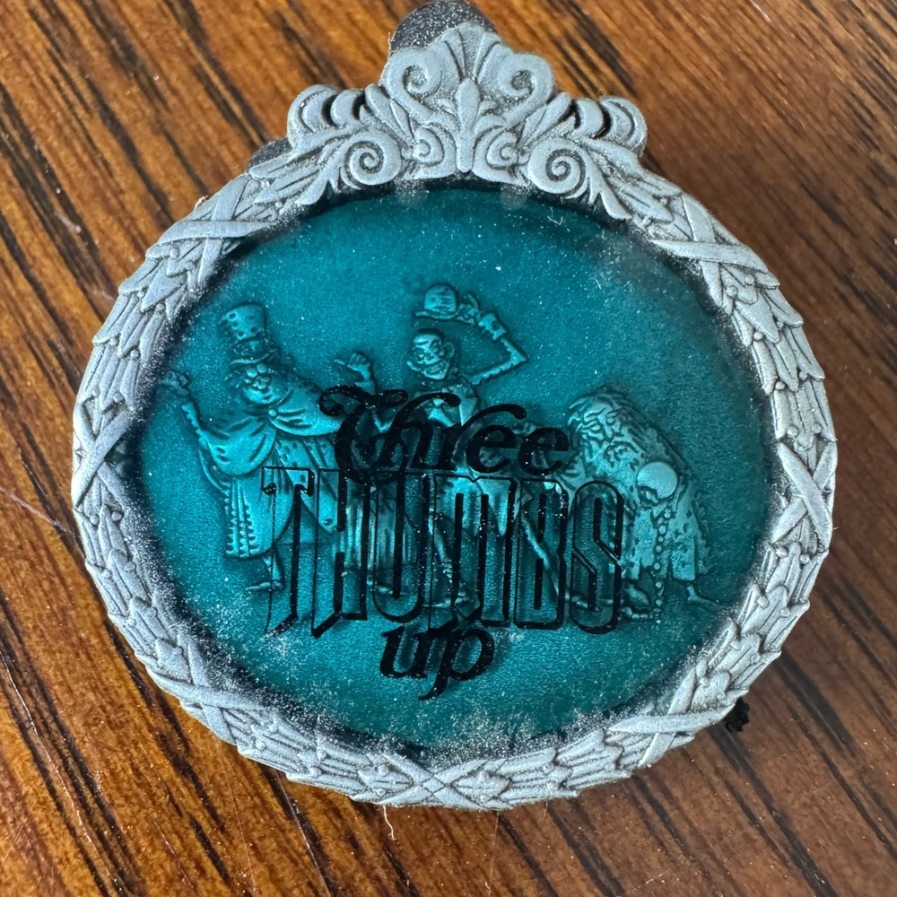 Authentic Disney Pin!  Three Thumbs up hitch hiking ghosts.  P389-7448-2-14261